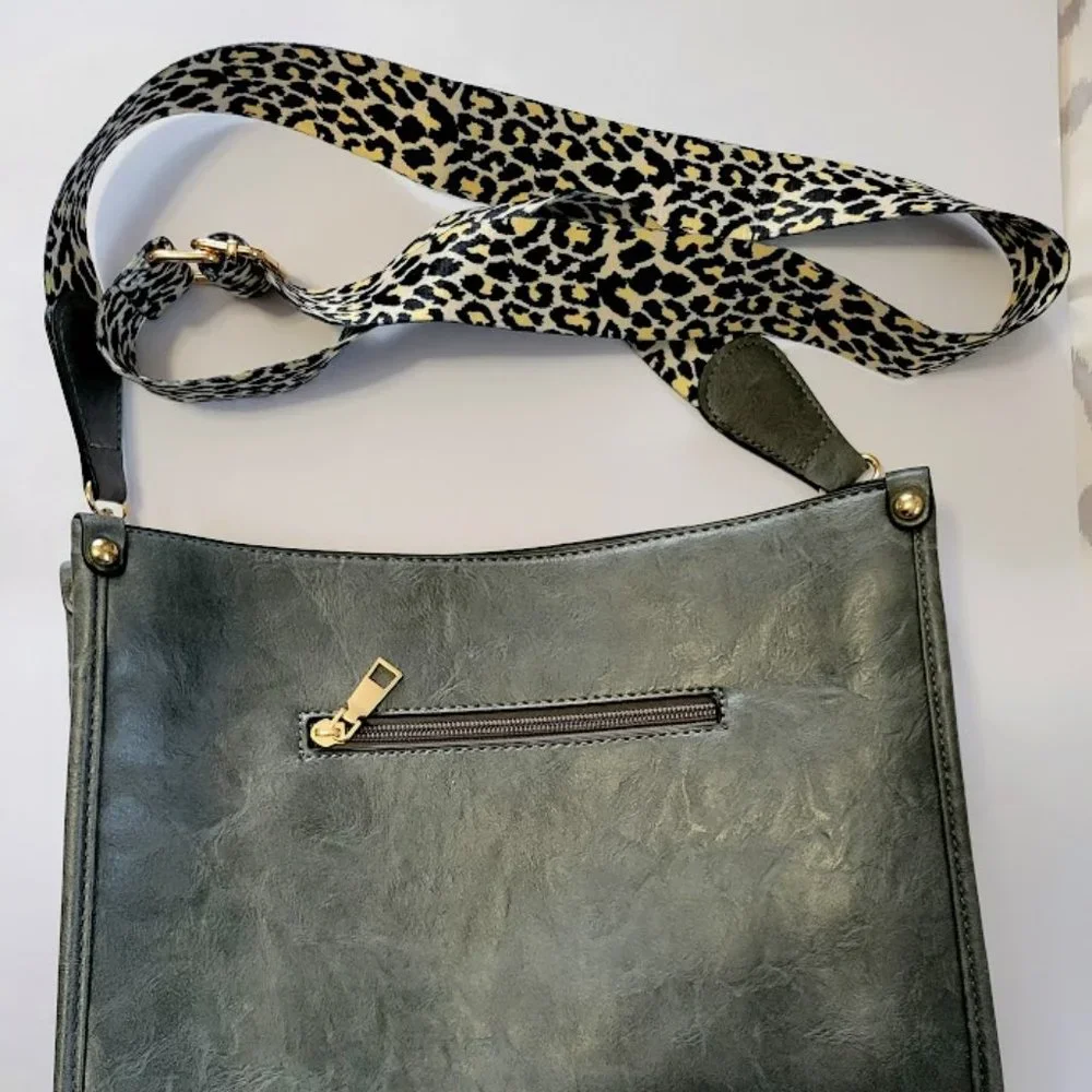Gunmetal gray faux leather handbag with animal print‎ fabric strap